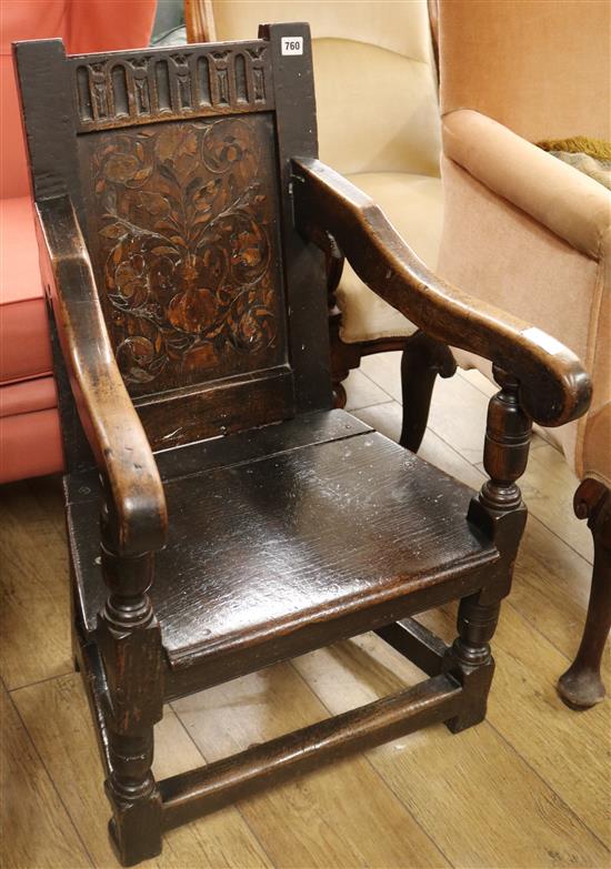 An oak panel-back chair, 17th century and later,